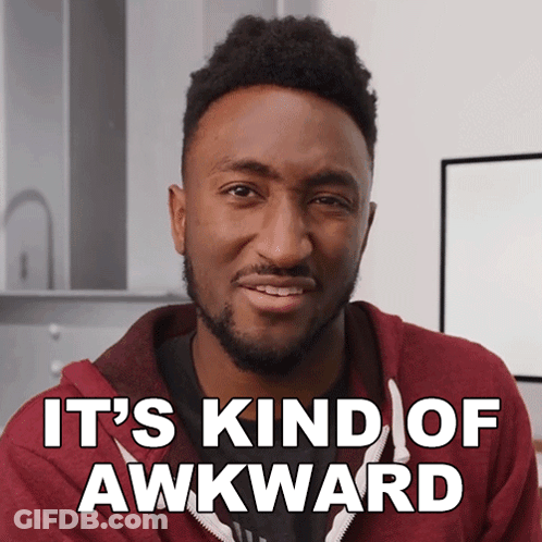 A Man In A Red Hoodie Says " It 'S Kind Of Awkward " In White Letters GIF