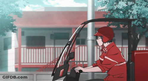 A Man In A Red Jacket And Helmet Is Driving A Red Vehicle GIF