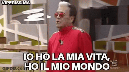 A Man In A Red Jacket And Sunglasses Says Io Ho La Mia Vita Ho Il Mio Mondo . GIF