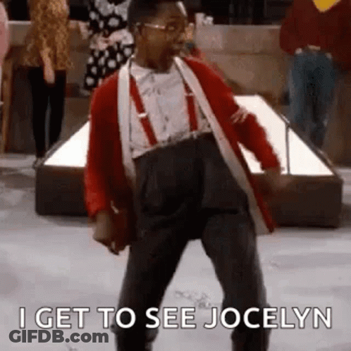 A Man In A Red Jacket And Suspenders Is Dancing In Front Of A Crowd . GIF