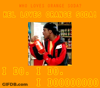 A Man In A Red Jacket Drinking Orange Soda GIF