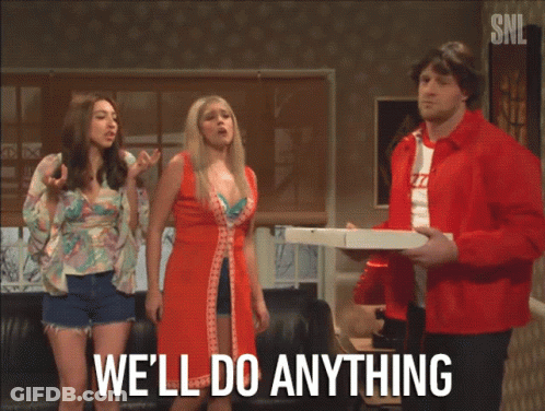 A Man In A Red Jacket Holding A Pizza Box Says We 'Ll Do Anything In Front Of Two Women GIF