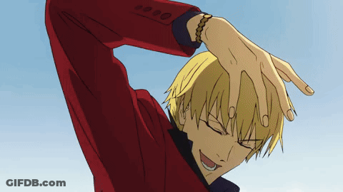 A Man In A Red Jacket Holds His Hand To His Head GIF