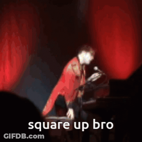 A Man In A Red Jacket Is Dancing With The Words Square Up Bro Written Below Him GIF