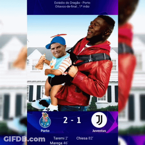 A Man In A Red Jacket Is Holding A Baby In Front Of A House And The Score Is 2-1 GIF