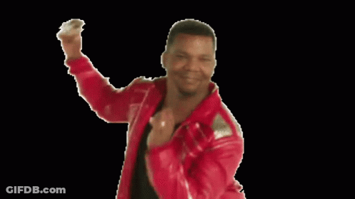 A Man In A Red Jacket Is Holding A Piece Of Paper In His Hand GIF