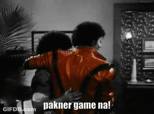 A Man In A Red Jacket Is Hugging Another Man With The Words Pakner Game Na On The Bottom GIF