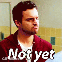 A Man In A Red Jacket Is Making A Funny Face With The Words Not Yet Written Below Him GIF