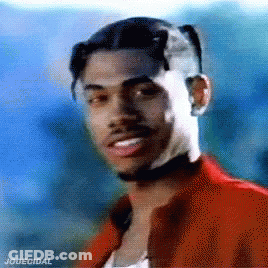 A Man In A Red Jacket Is Smiling And Has The Word Jodecidal On The Bottom Right GIF