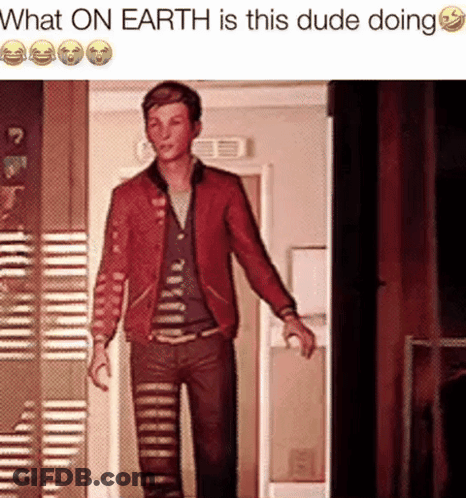 A Man In A Red Jacket Is Standing In A Hallway With The Words What On Earth Is This Dude Doing GIF