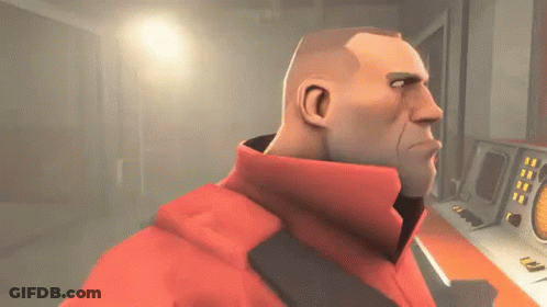 A Man In A Red Jacket Is Standing In Front Of A Control Panel . GIF