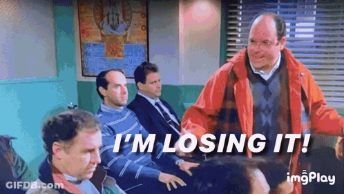 A Man In A Red Jacket Is Standing In Front Of A Group Of Men . GIF