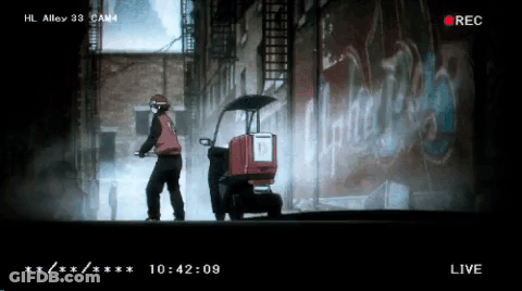 Man In Red Jacket Next To HL Alley 33 Box GIF