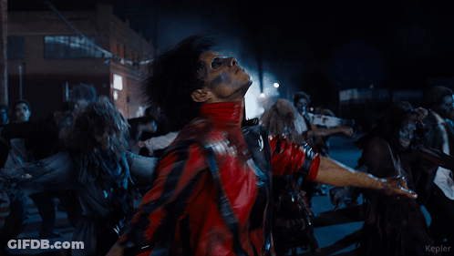 A Man In A Red Jacket Is Surrounded By Zombies And The Word Kepler Is On The Bottom GIF