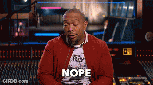 A Man In A Red Jacket Says Nope In Front Of A Sound Board GIF