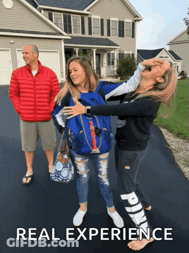 A Man In A Red Jacket Stands Behind Two Girls With The Words Real Experience Written Below Them GIF