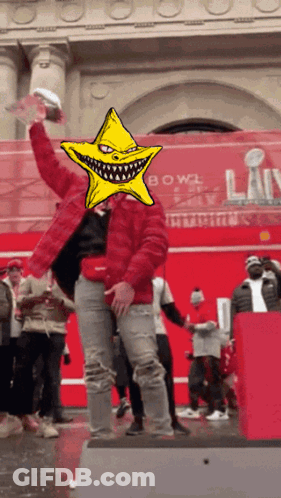 A Man In A Red Jacket With A Yellow Star In Front Of His Face GIF