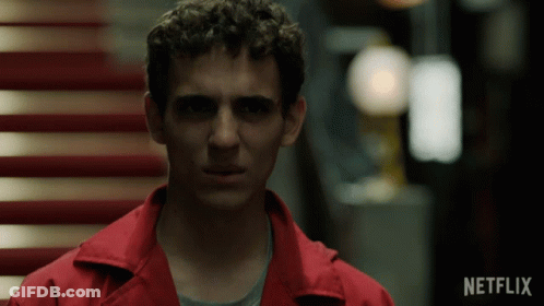 A Man In A Red Jacket With The Word Netflix On The Bottom Right GIF