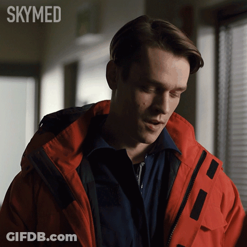 A Man In A Red Jacket With The Word Skymed On The Bottom Right GIF