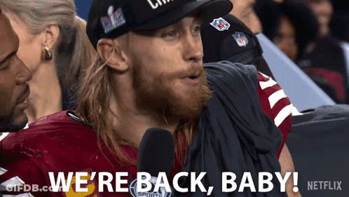 A Man In A Red Jersey Says We 'Re Back Baby GIF