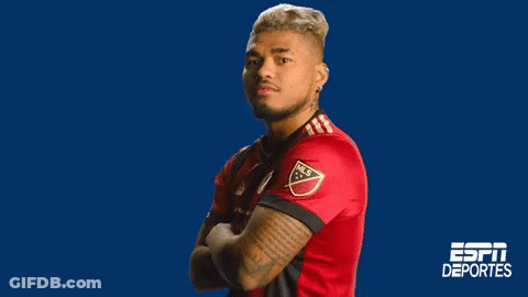 A Man In A Red Jersey With Espn Deportes On The Bottom Right GIF