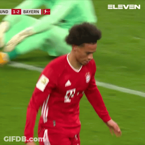 A Man In A Red Jersey With The Number 12 On It GIF