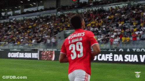 A Man In A Red Jersey With The Number 39 On It GIF
