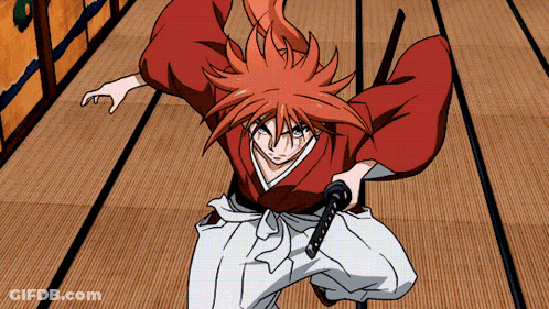 A Man In A Red Kimono Is Holding A Sword In His Right Hand GIF