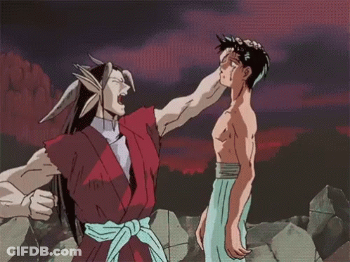 A Man In A Red Kimono Is Pointing At Another Man In A White Towel GIF