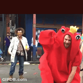 A Man In A Red Lobster Costume Is Dancing GIF