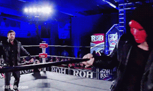 A Man In A Red Mask Is Holding A Sword In Front Of A Sign That Says Roh On It GIF