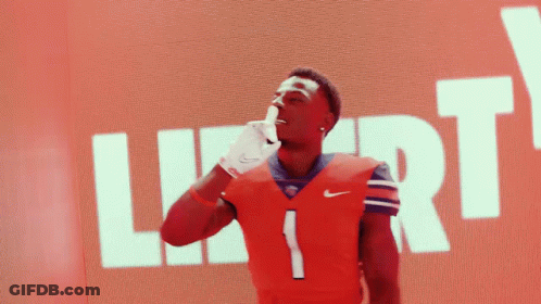 A Man In A Red Nike Jersey With The Number 1 On It GIF