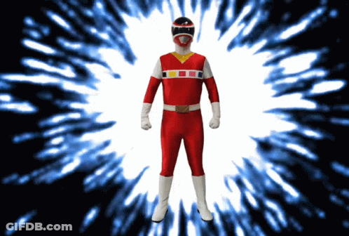 A Man In A Red Power Ranger Costume Is Standing In Front Of A Blue Explosion GIF