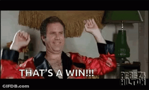 A Man In A Red Robe Is Celebrating With His Arms In The Air And Says `` That 'S A Win ! '' GIF
