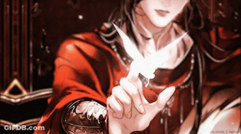 A Man In A Red Robe Is Holding A Small White Bird GIF