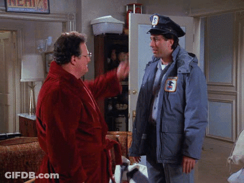 A Man In A Red Robe Is Talking To A Man In A Mailman Uniform GIF