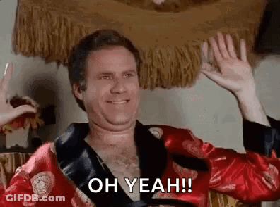 A Man In A Red Robe Is Waving His Hands And Saying `` Oh Yeah '' . GIF