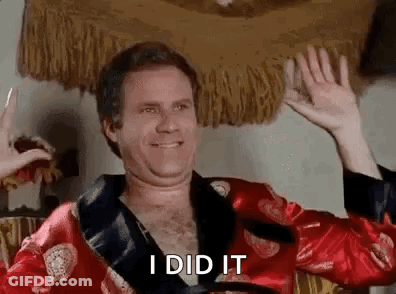 A Man In A Red Robe Is Waving His Hands In The Air And Smiling . GIF