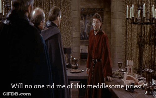 A Man In A Red Robe Stands In Front Of A Table With The Words Will No One Rid Me Of This Meddlesome Priest Below Him GIF