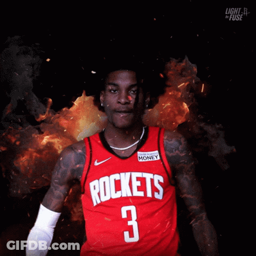 A Man In A Red Rockets Jersey With The Number 3 GIF