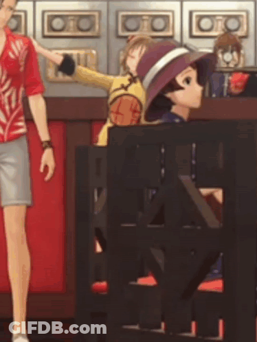 A Man In A Red Shirt And Shorts Is Standing Next To A Cartoon Character In A Purple Hat . GIF