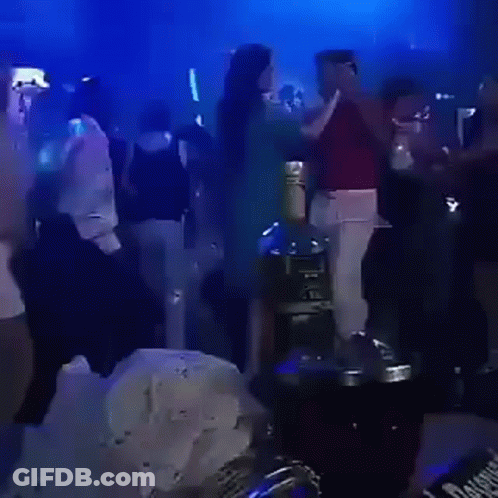 Man Dancing In Red Shirt And White Pants GIF