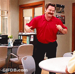 A Man In A Red Shirt Is Dancing In A Room With Chairs GIF