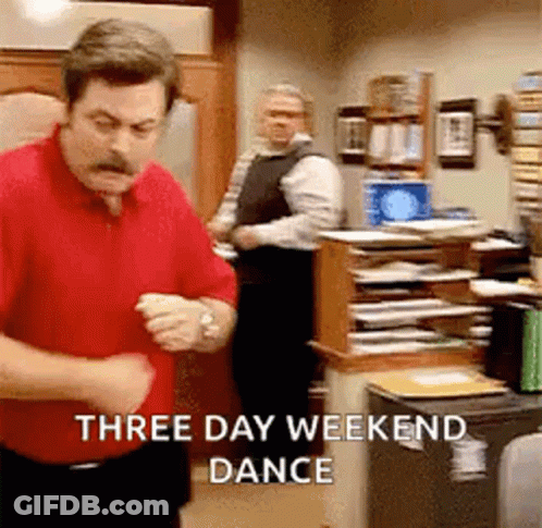 A Man In A Red Shirt Is Dancing In An Office While Another Man Looks On . GIF