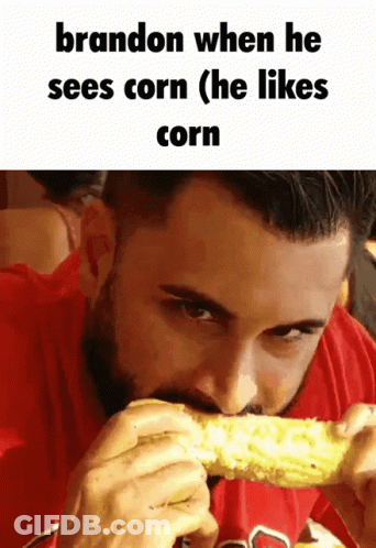 A Man In A Red Shirt Is Eating Corn With The Caption Brandon When He Sees Corn ( He Likes Corn ) GIF