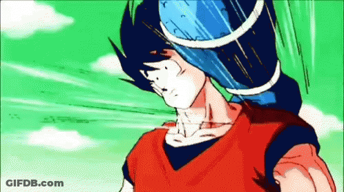 A Man In A Red Shirt Is Holding A Blue Ball On His Head GIF