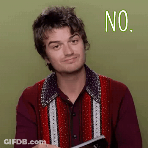 A Man In A Red Shirt Is Holding A Book And Making A No Sign GIF