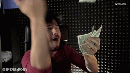 A Man In A Red Shirt Is Holding A Bunch Of Money In His Hands GIF