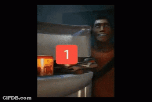 A Man In A Red Shirt Is Holding A Glass Of Water GIF