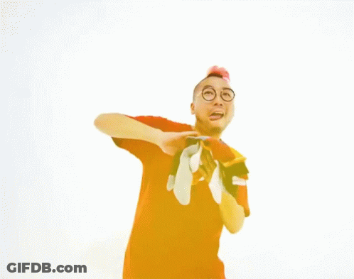 A Man In A Red Shirt Is Holding A Pair Of Socks And The Words You And Me Are Above Him GIF